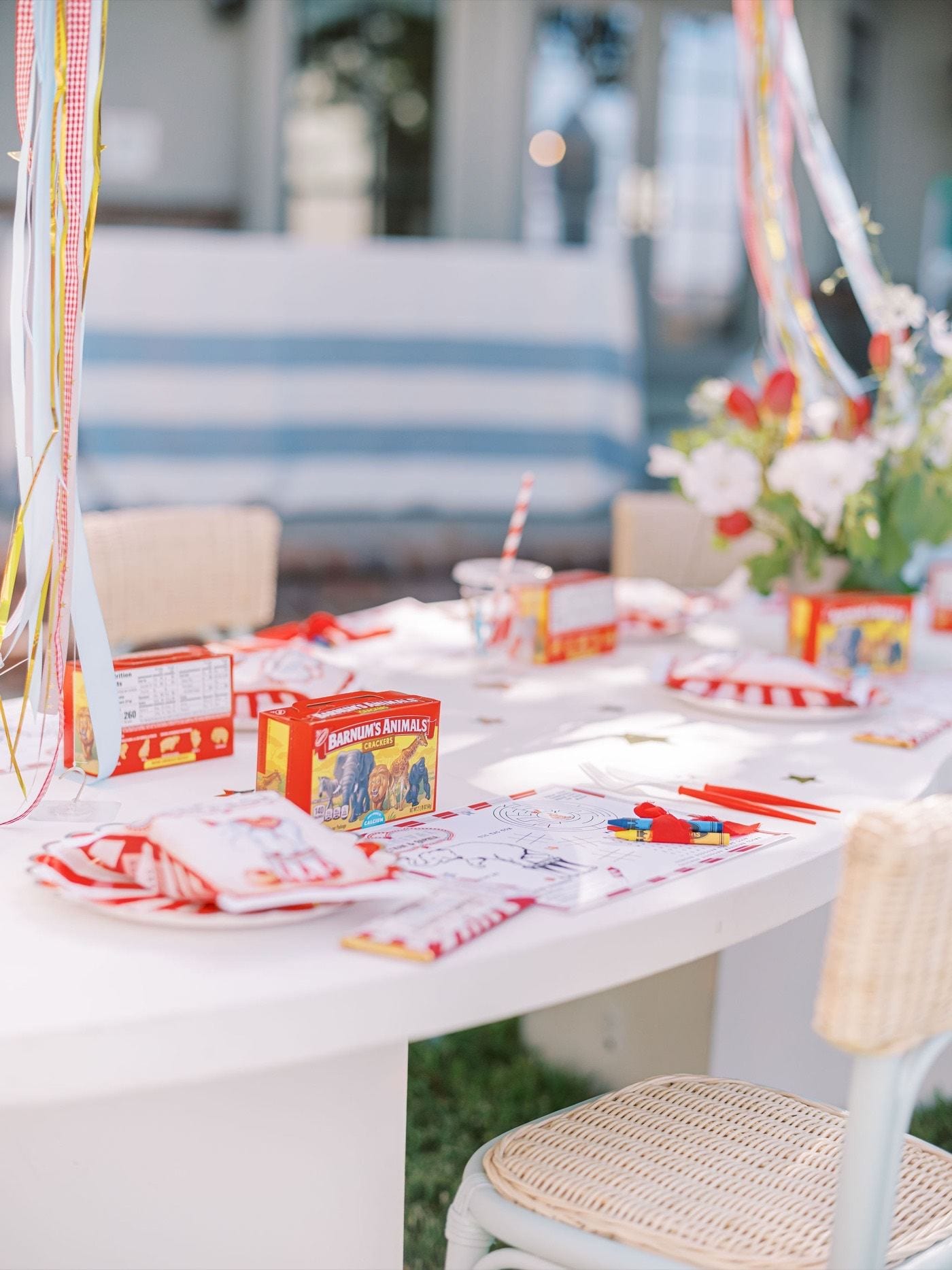 A styled kids party table with a carnival theme
